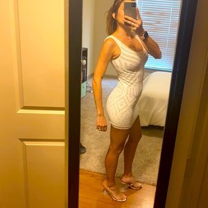 Bebe dress. White. Very tight and stretchy Size S